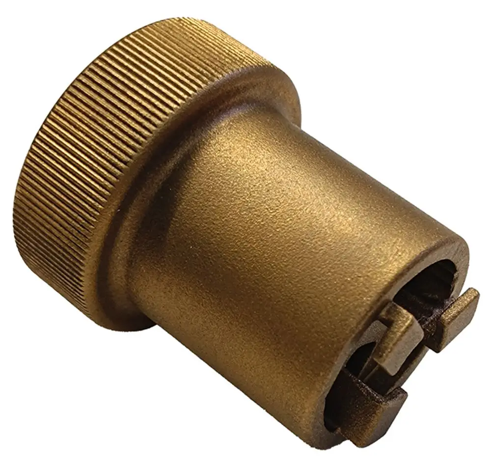 Goldfarbenes Montagewerkzeug mit einem geriffelten Griff und einer Öffnung für spezielle Einsätze. Hersteller ist Syr. Das Werkzeug scheint für Installationen konzipiert zu sein.